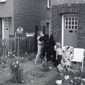1980 and the cousins in the garden with the teddy bear
