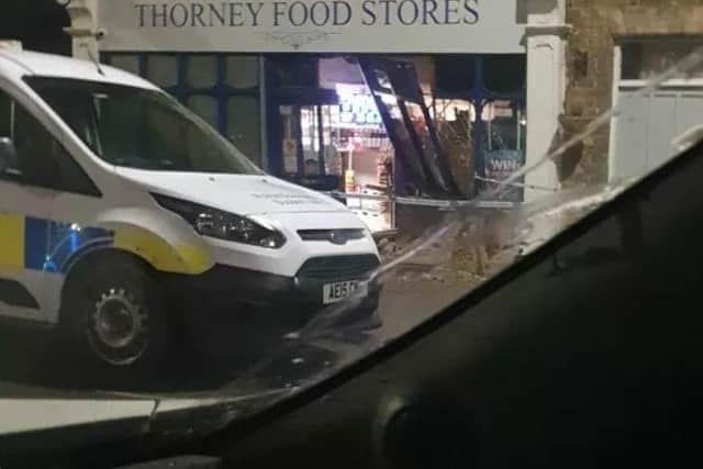 Damage caused to the frontage of Thorney Food Stores.