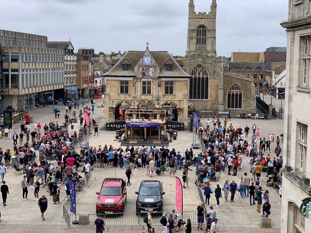 Spectators enjoy a trial of strength at Peterborough's Strongest event in Cathedral Square