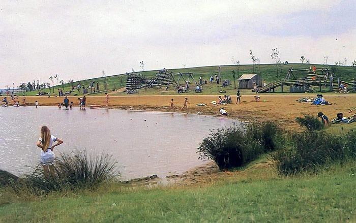 An early promotional image showing the beach and an early play area in Ferry Meadows, probably taken during the early 1980s.