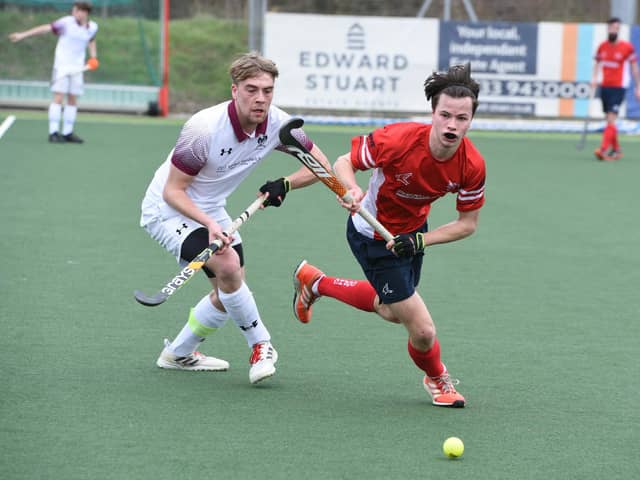 Ben Goold (red) in action for City of Peterborough against Bedford. Photo: David Lowndes.