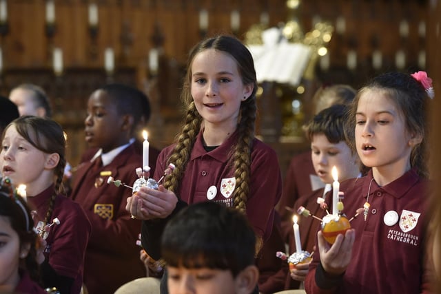Traditional carols were sung at the Christingle service at Peterborough Cathedral.