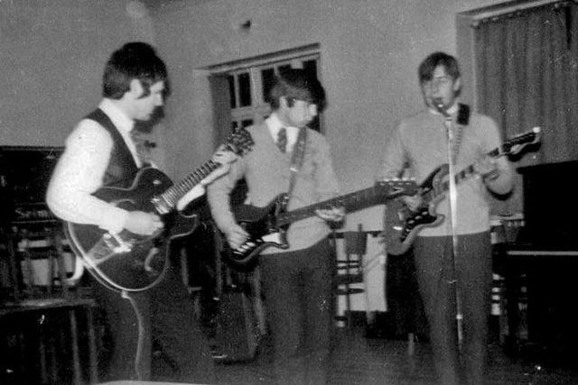 Local beat group Sebastian’s People featuring Pete ‘Rattler’ Lane, Maurice Stacey, Phil Cox and Godfrey West on drums, later joined by keyboard player Martin “Sooty” Dunnett. 
This photo was taken of the band rehearsing in Werrington Village Hall (image: Peterborough Images Archive)