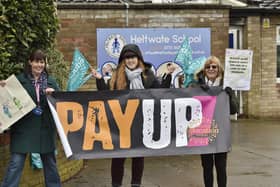 Teachers form a picket line at Heltwate School