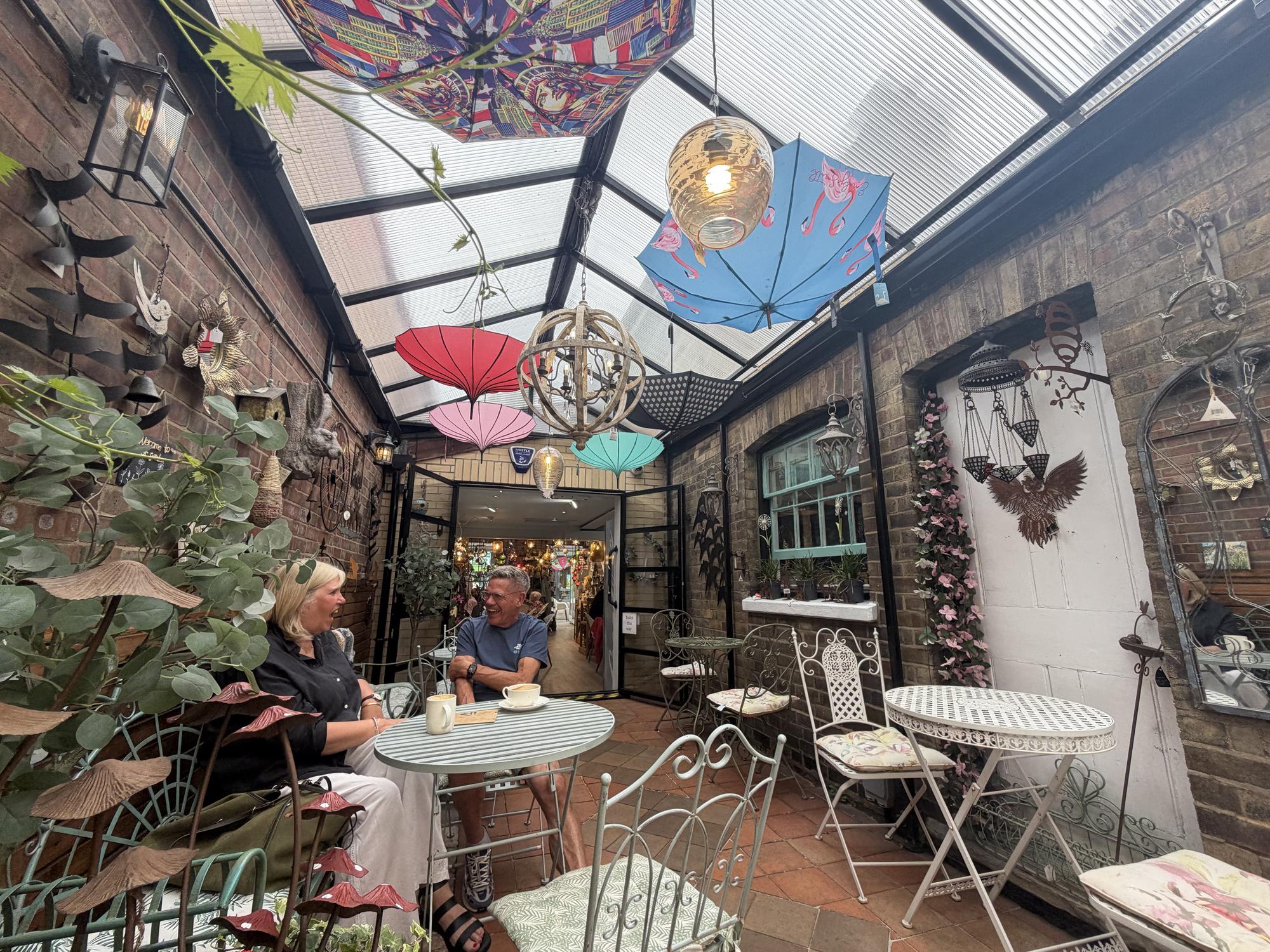 Inside the quirky Peterborough city centre cafe with umbrellas hanging ...