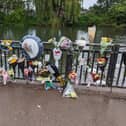 Floral tributes left by the River Nene.
