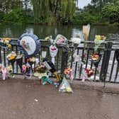 Floral tributes left by the River Nene.