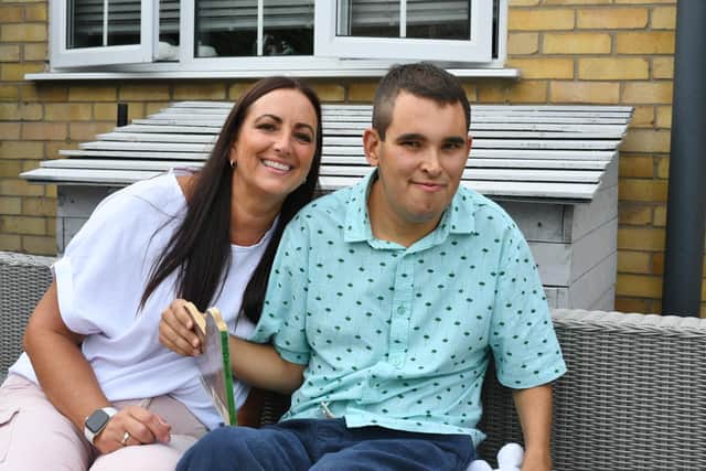 Liza Raby and her son Spencer Raby at home in Bourne