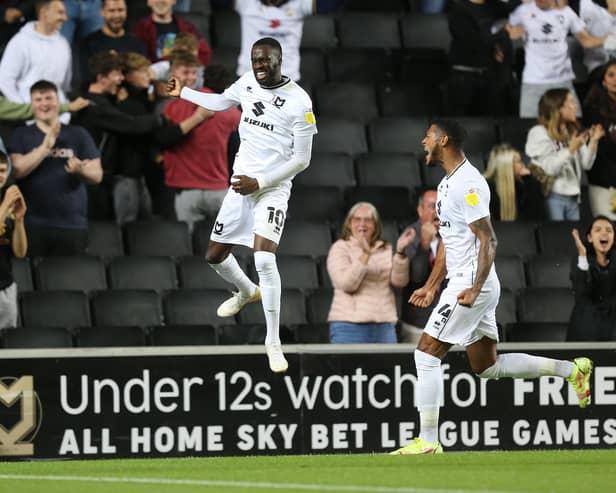 Mo Eisa celebrates a goal for MK Dons (Photo by Pete Norton/Getty Images).
