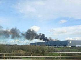 Smoke could be seen coming from the roof of the factory for miles around