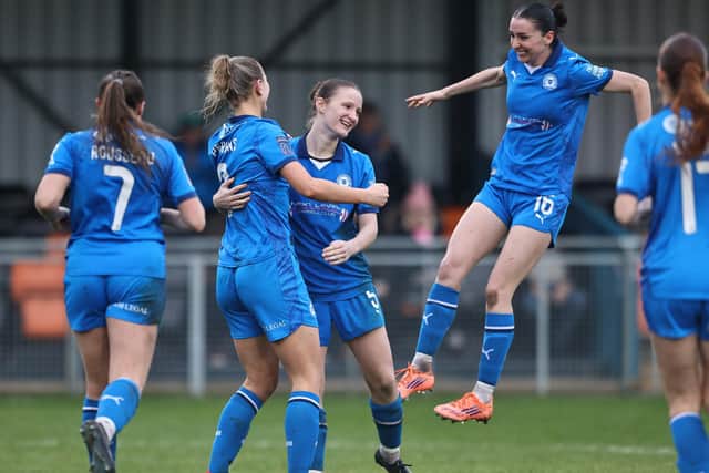 Peterborough United celebrate against Kidderminster Harriers. Photo: Darren Wiles.