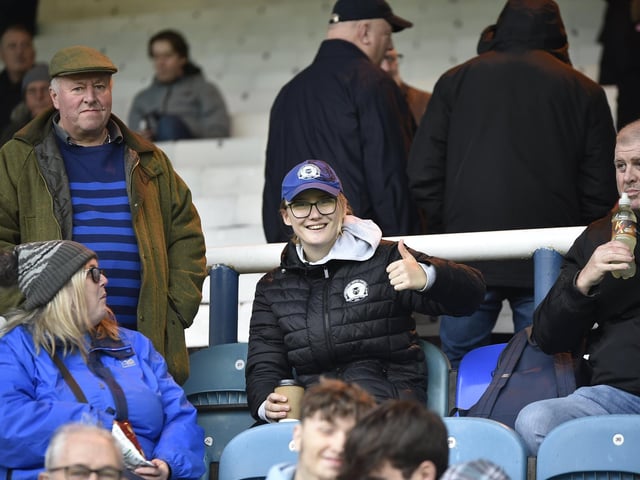Peterborough United fans watch their side struggle to a 2-2 draw at home to Salford.