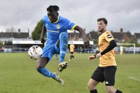 Diadier Camara (blue in action for Peterborough Sports against Southport. Photo: David Lowndes.