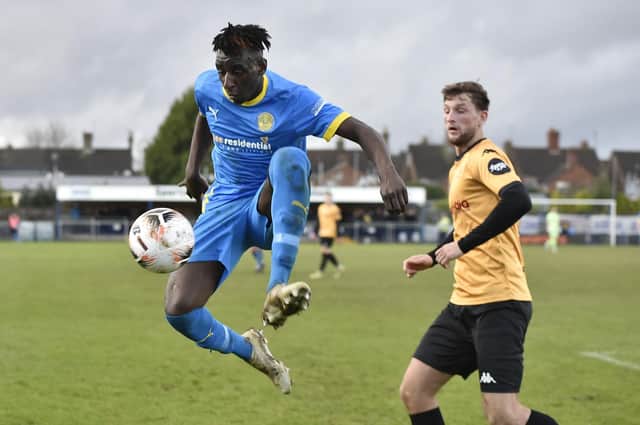 Diadier Camara (blue in action for Peterborough Sports against Southport. Photo: David Lowndes.