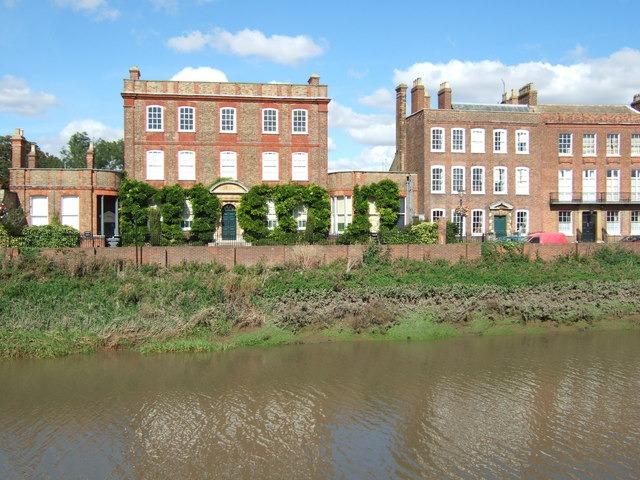 Described by the National Trust as "an oasis hidden away in an urban environment", Peckover House and Garden is located on the banks of the River Nene in Wisbech. The house was built in 1722 and given Grade II listed status in 1985. The house and garden, now managed by the National Trust, is open to the public five days a week.