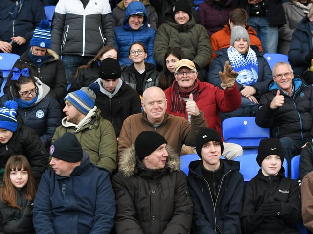 Peterborough United fans take in the win over Shrewsbury Town.