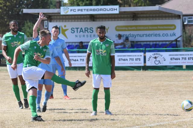 Action from FC Peterborough (green) v Moulton Harrox in the Peterborough Premier Division. Photo: David Lowndes.