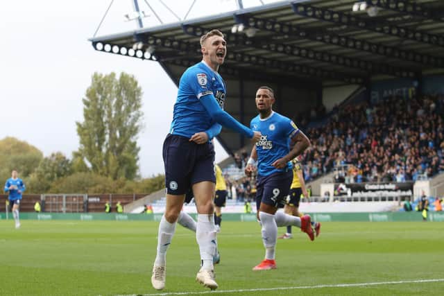 Jack Taylor of Peterborough United celebrates his goal at Oxford. Photo: Joe Dent/theposh.com.