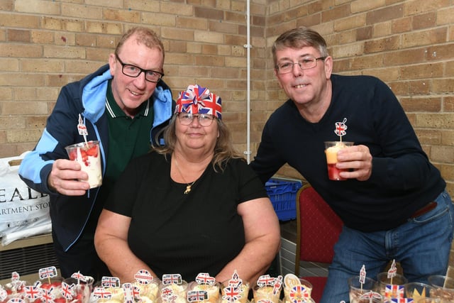 HELP charity at South Grove Community Centre. Dave Rowntree (left), the drummer of the band Blur, with volunteer Angie Cowlan and (centre) and chairman Nick Thulbourn (right) at a Jubilee roast beef lunch for the homeless and the lonely.