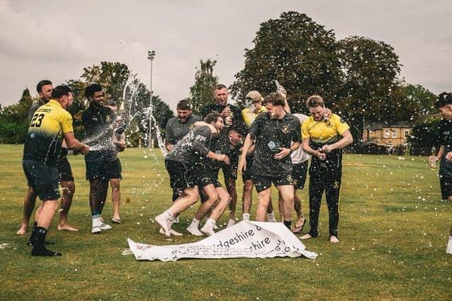 Ramsey CC celebrate their Cambs Division One title success. Photo courtesy of Ramsey CC.
