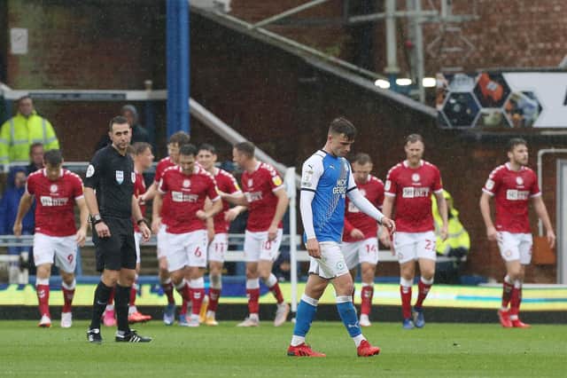A familiar scene from the Championship this season as the opposition celebrate behind a crestfallen Posh player.  Photo: Joe Dent/theposh.com.