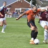 Josh McCammon (orange) in action for Peterborough Sports against South Shields. Photo: David Lowndes.