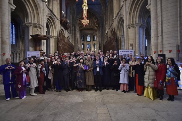 Lord Lt. Julie Spence with Faustina Yang receiving the King's Award for Voluntary Services at Peterborough Cathedral -  pictured with her volunteers