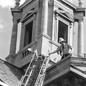 Cambridgeshire Fire and Rescue Service take part in training drills at Peterborough Town Hall in 1981.