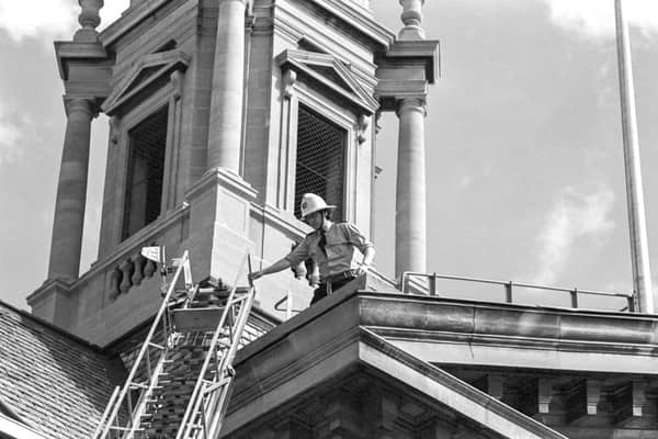 Cambridgeshire Fire and Rescue Service take part in training drills at Peterborough Town Hall in 1981.