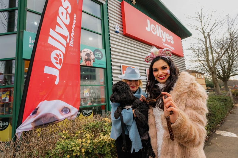 Pauline Makey, the owner of Scamp the cockerpoo and singer Gabriella Pineda-Rodrigues at the official opening of Jollyes pet store in Peterborough.