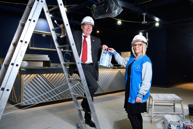 Jennifer Gillard, the manager of Puttstars in Peterborough, with Mark Broadhead, Queensgate centre director, at the site of the Puttstars mini-golf centre that is under construction in the Queensgate shopping centre.
