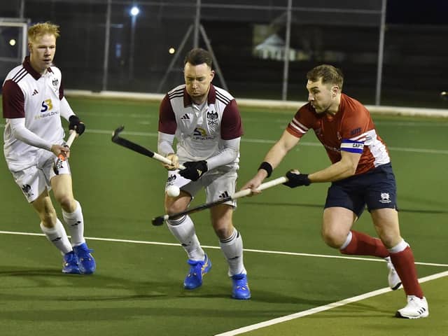 Joe Finding (red) in action for City of Peterborough against Bedford. Photo David Lowndes.