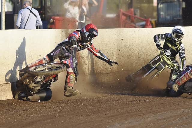 Michael Palm Toft crashes during Peterborough's victory over Ipswich. Photo: David Lowndes