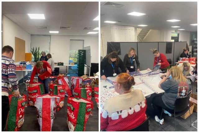 Staff from Compare the Market in Peterborough prepare Christmas gifts for more than 100 local families