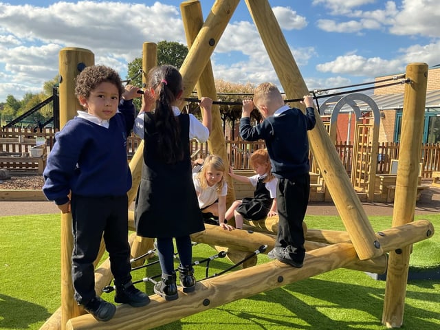 Youngsters try out the new outdoor climbing equipment