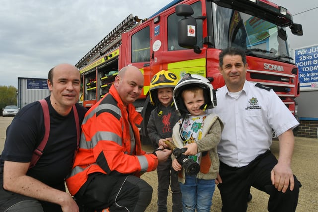  Opening of the Inspired Playtown at Hampton.  Peterborough Volunteer firefighters Kevin Duke, Nick Cowley and watch commander Anthony Gould with four-year-olds Arthur Preston and Boden Thompson