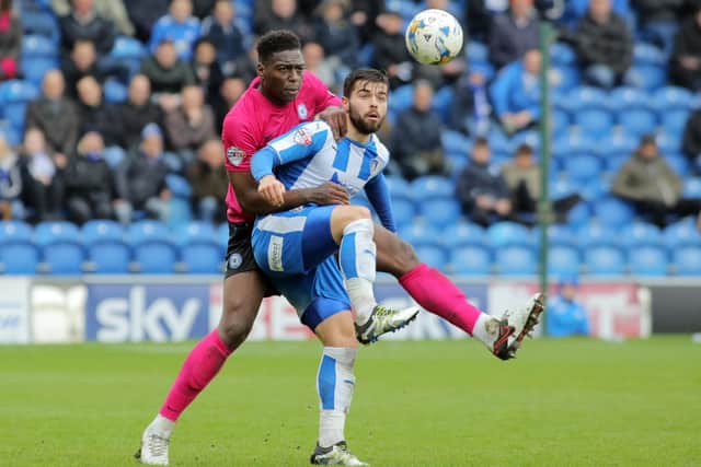 Ricardo Santos (pink) in action for Posh. Photo Joe Dent/theposh.com.