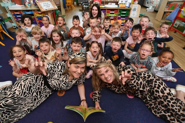 Woodston Primary School's reception class with teachers Lindsey Wilson, Toni Jones and Iwona Czapaicka-Mroz dressed-up as animals to raise money for the WWF at the school's 'Wear it Wild' day.