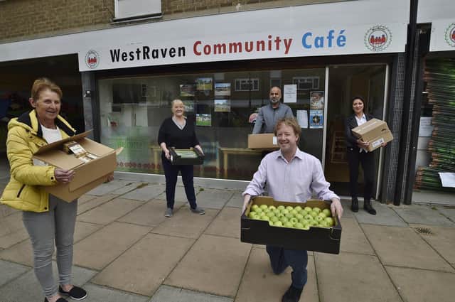 Ishfaq Hussain, Paul Bristow MP and Jagoda Kwiatkowska supplying food to Margaret Prince and Christine Nice (left) from the  WestRaven Community Cafe in 2020.