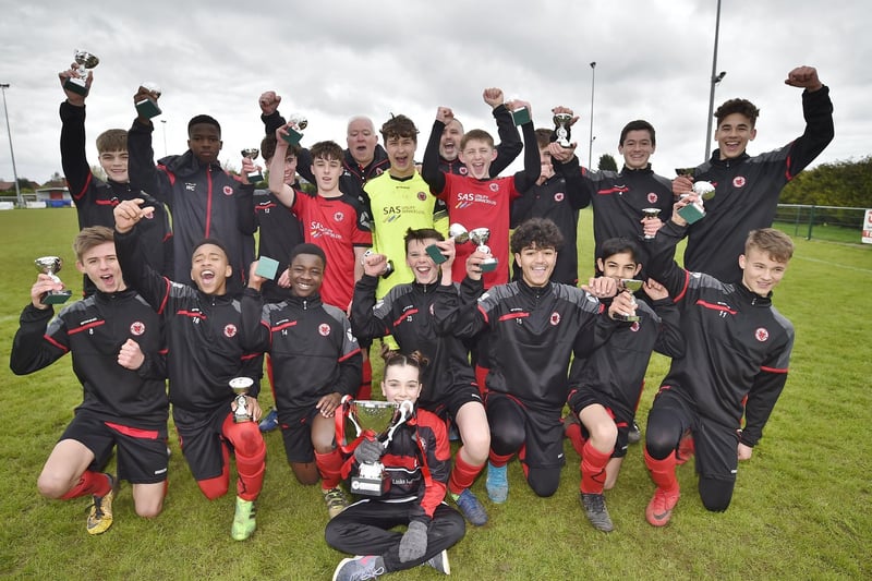 Peterborough and District Junior Alliance League football Under 14's League Cup final winners Netherton United Youths celebrate success.