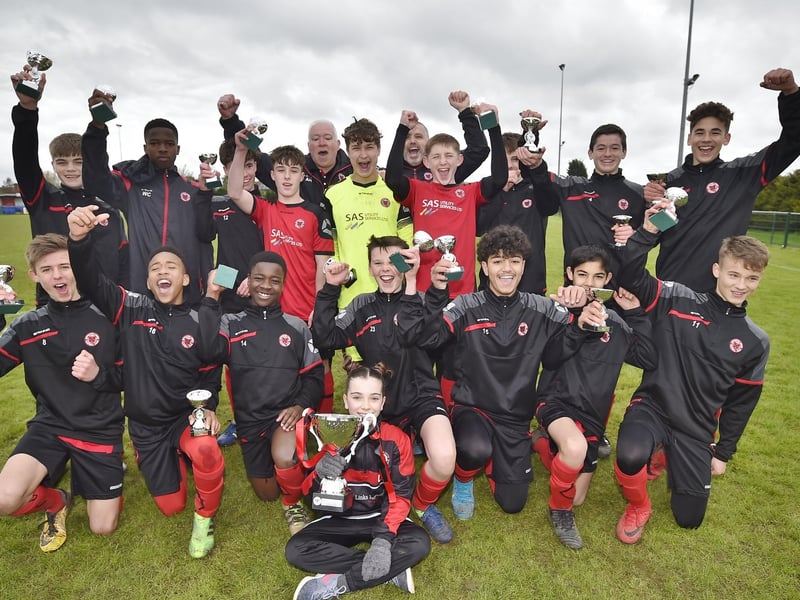 Peterborough and District Junior Alliance League football Under 14's League Cup final winners Netherton United Youths celebrate success.