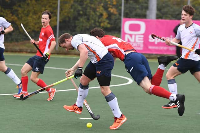 Action from City of Peterborough (red) v St Albans. Photo: David Lowndes.