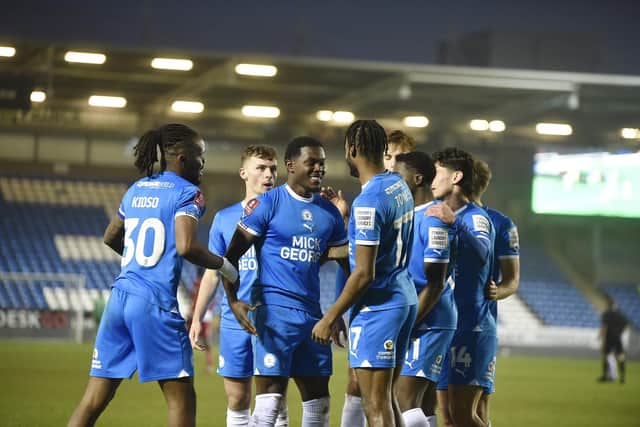 Posh celebrate Ephron Mason-Clark's goal against Doncaster. Photo: David Lowndes.