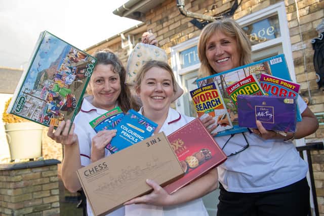 Staff at the Hermitage Rest Home, Whittlesey, with the gifts donated by local developer Barratt Homes