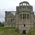 Lyveden New Bield, located in Northamptonshire, is an unfinished Elizabethan summer house and moated garden commissioned by Sir Thomas Tresham in the late 16th century. It was abandoned in 1605 after Tresham's death. The house has remained unfinished for more than 400 years and is now managed by the National Trust.