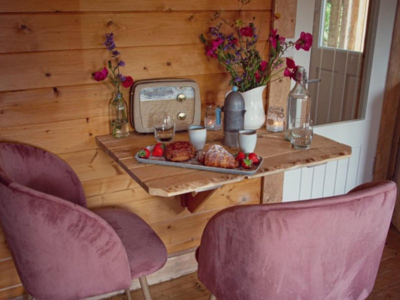 A seating area is perfect for a morning cuppa and pastry.