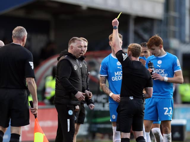 Peterborough United Manager Darren Ferguson in disbelief as he is shown a yellow card by the match referee. Photo: Joe Dent.