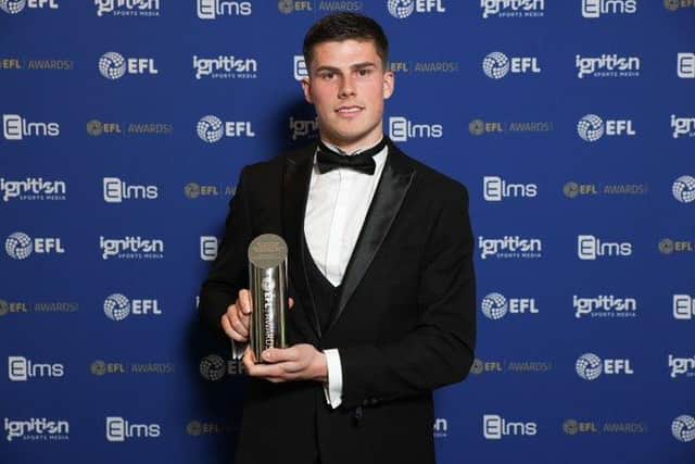 Posh star Ronnie Edwards with his League One young player of the year award. Photo courtesy of the EFL