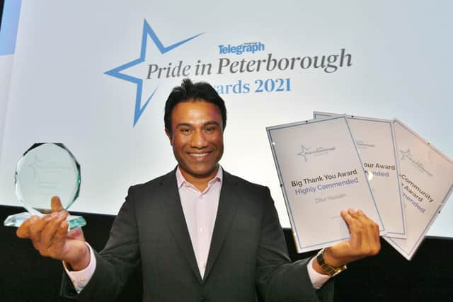Zillur Hussain with his awards at the Pride of Peterborough awards 2021.