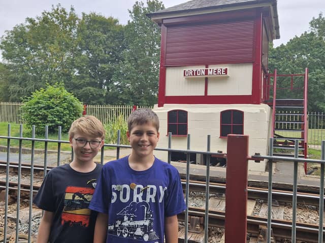 Oliver and Harry by the repaired signal box
